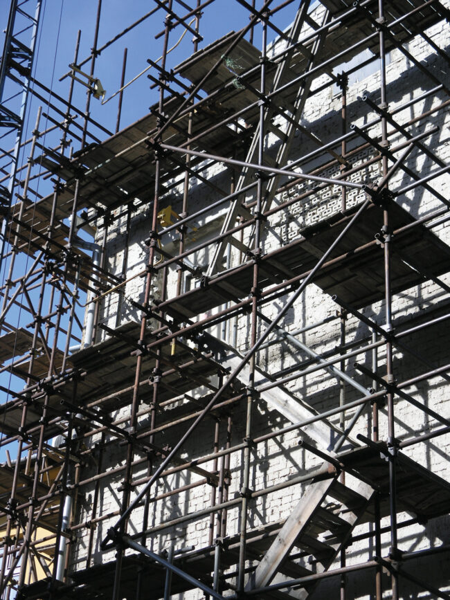 Scaffold on old building